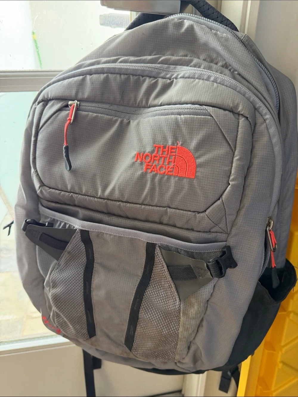 The North Face Gray Backpack with Neon Pink Accents